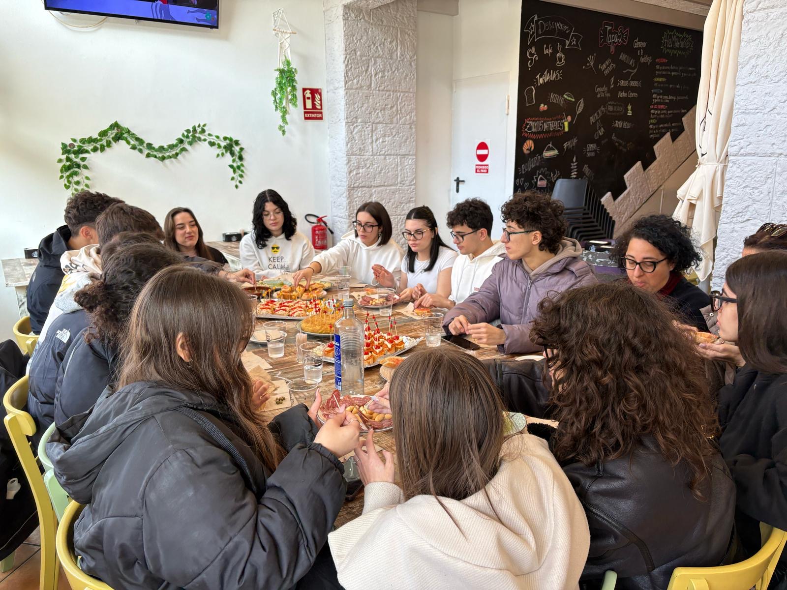 Student group participating in a gastronomy learning activity in Spain